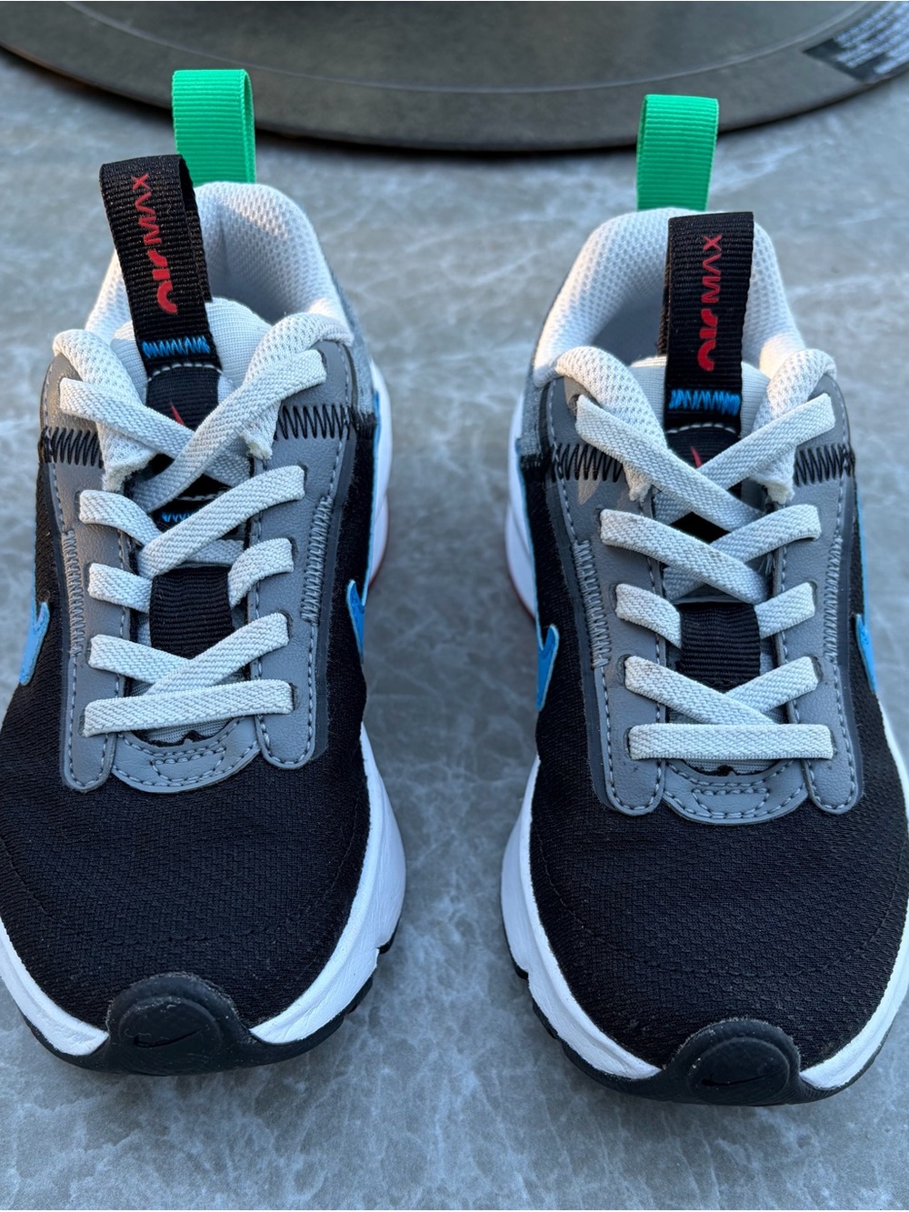 Nike Kids Black and Gray Sneakers with Bright Blue and Green Accents